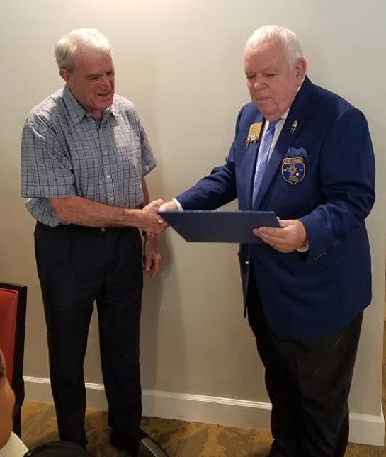 DG Jim presented a Governor's Lifetime Service Commendation to Rotarian Larry Brewer for his 43-year Rotary "career" at his visit to Fayetteville, led by President Vickie Butler