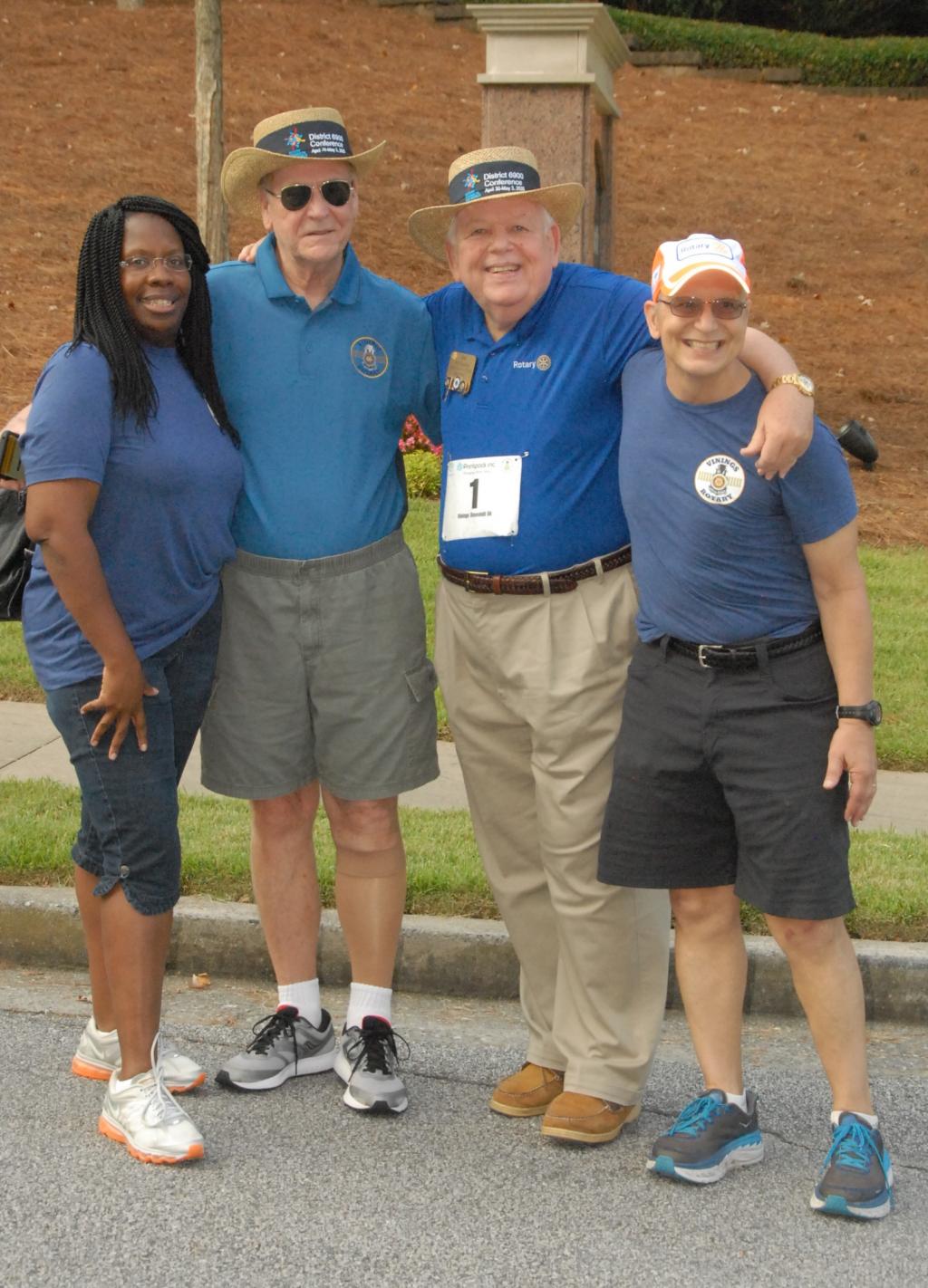 Vinings Cumberland Club President Donna Drakes with PDG Ted Propes, DG Jim Squire and Rotarian Race Director Charles Heinz at the starting line