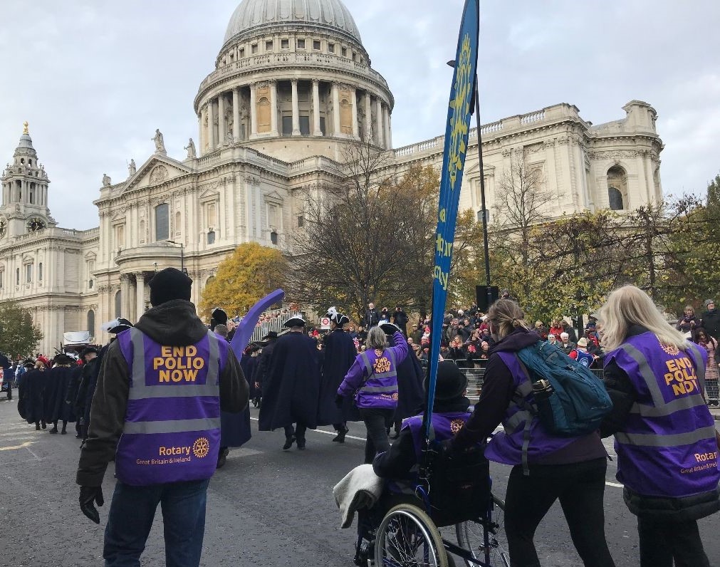 Global Grant Scholar Sean and Amy Minton volunteered to walk with Rotarians from London in the Lord Mayor's Show on 9 November.  For those that are not familiar, this is a traditional parade that dates back to 1215 A.D. with King John, and one that has evolved into a quite pompous ceremony (think Macy's Day Parade size).  Each year the newly appointed Lord Mayor of London processes through the city in a stagecoach that is more than 250 years old.  City businesses, charities, marching bands and armed forces, etc. all join in for a parade that spans the city center along a 2-mile route. You can see by the tabbard Sean is wearing (on the left in the above photo), that the appearance in the parade also raised awareness for Rotary's campaign to end polio.  The Lord Mayor's Show is broadcast on the BBC network, and is attended by nearly 500,000 Londoners and tourists.  
