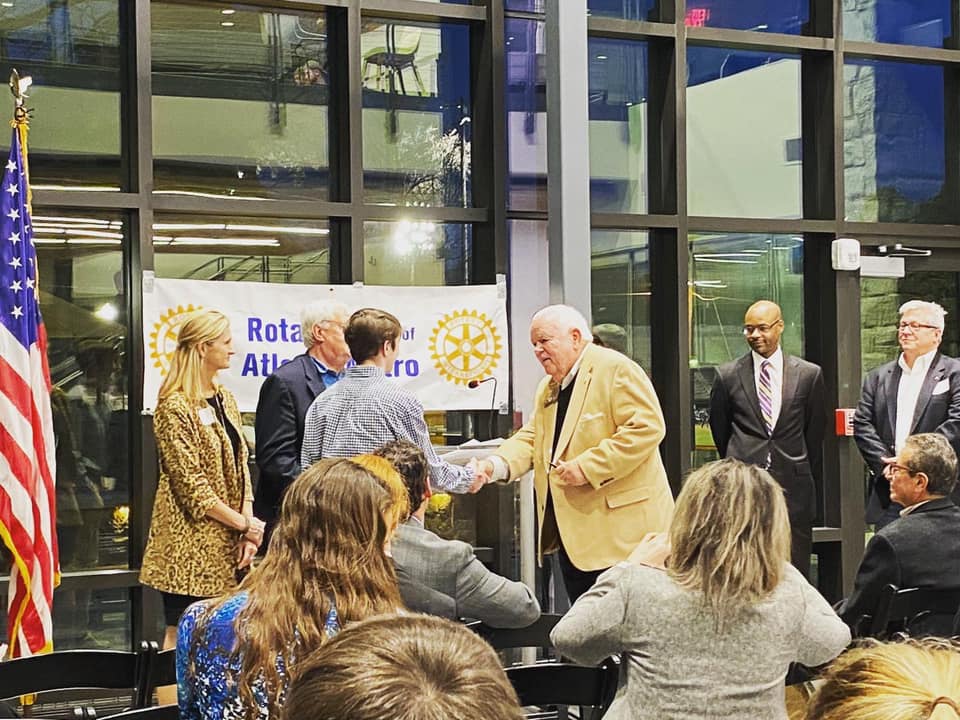 DG Jim with the Rotaract Club of Atlanta and the Atlanta Metro Rotary Club in early March - before our days of social distancing