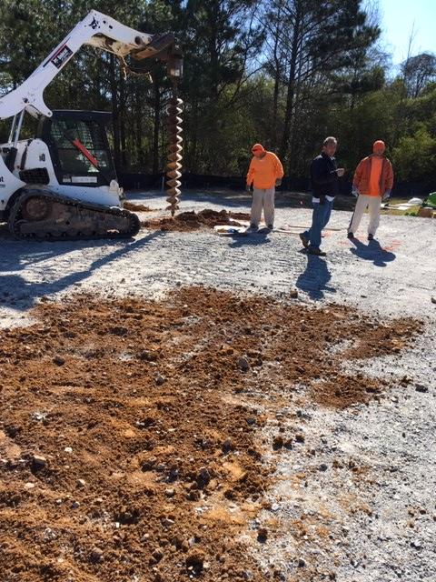 18 Augur drilling holes.JPG