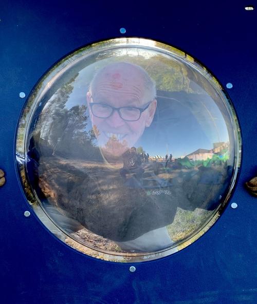 49 Past president George Leneaus seeing thru the window.jpg